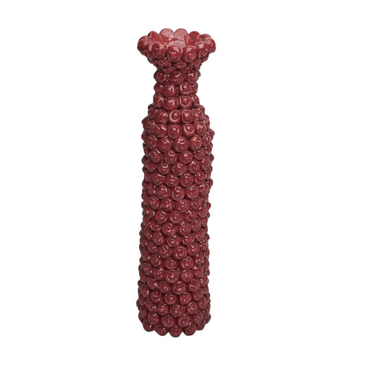 Decorative vase with smiles stacked on a white background
